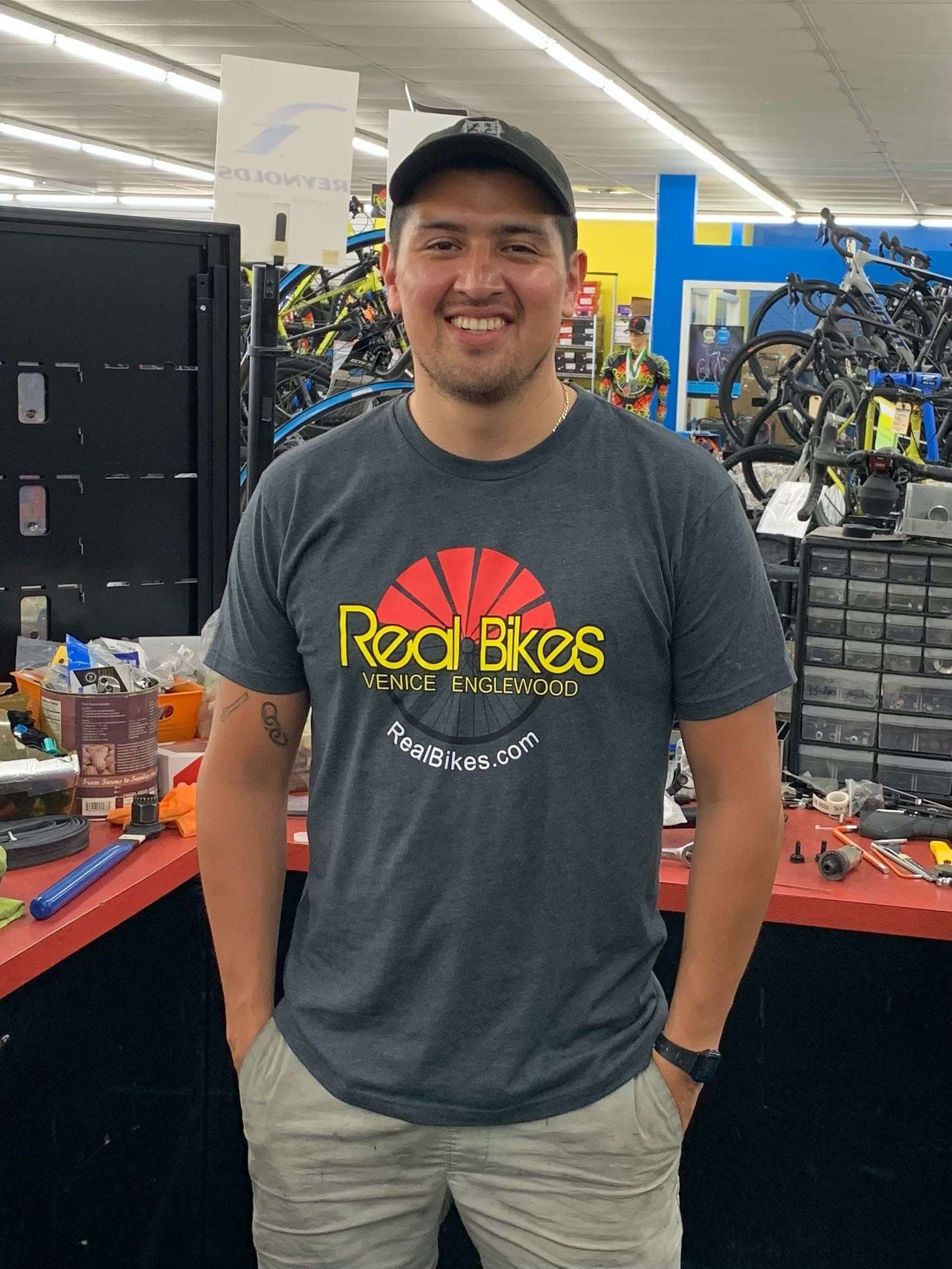 Inside the Real Bikes showroom, racks of new bikes
